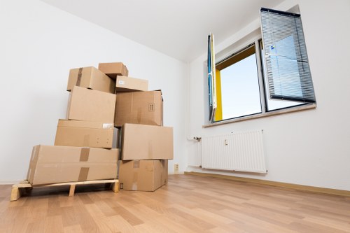 A local office relocation team handling desks and boxes near Edgware