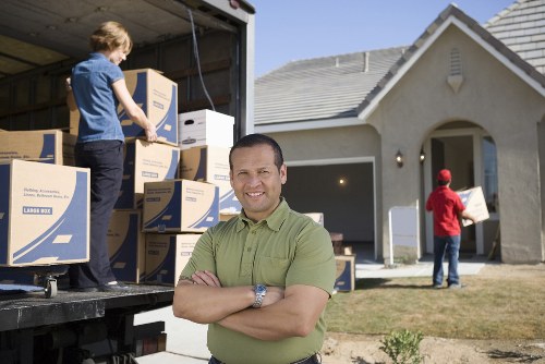 Careful loading of furniture into a moving van