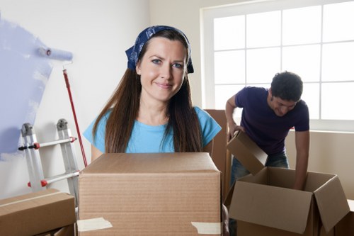 Moving professionals handling furniture during a relocation