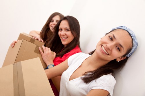 Customer and movers reviewing access and liability conditions