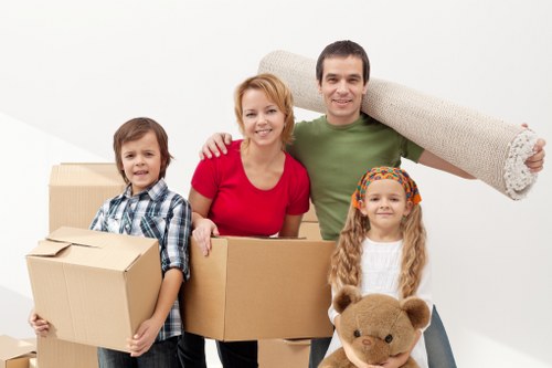 Edgware removals team handling boxes and furniture during a move