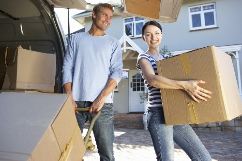Packed boxes and furniture prepared for a local move in Edgware
