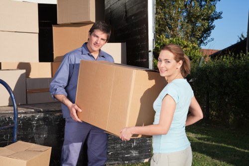 Packing boxes and furniture for a home move in Edgware